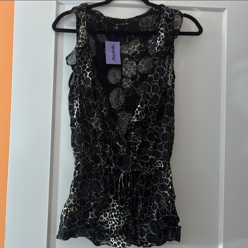 Black Sleeveless Tank Top with Plunging V-Neck and Ruffled Style